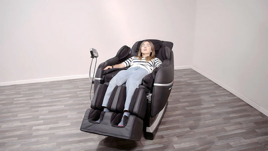 Woman Relaxing In A Modern Massage Chair, Demonstrating How To Choose A Massage Chair